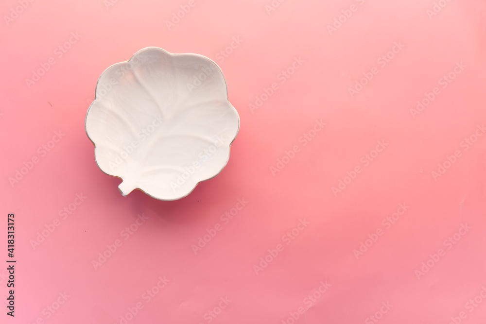 leaf shape design empty plate on pink background top down leaf shape design empty plate on pink background top down