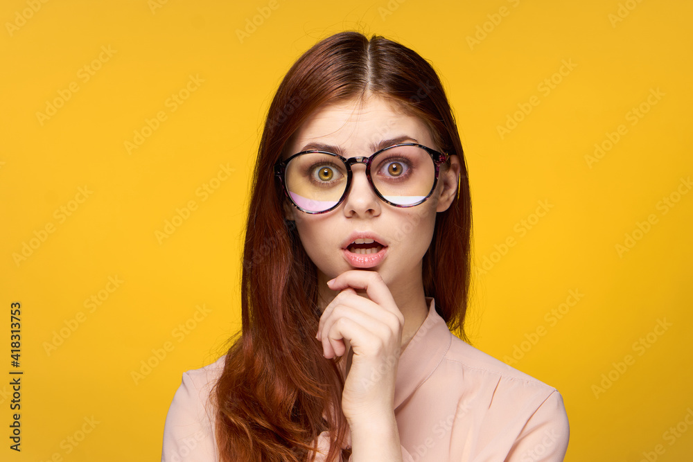smiling woman with glasses glamor face sleeves yellow background luxury smiling woman with glasses glamor face sleeves yellow background luxury