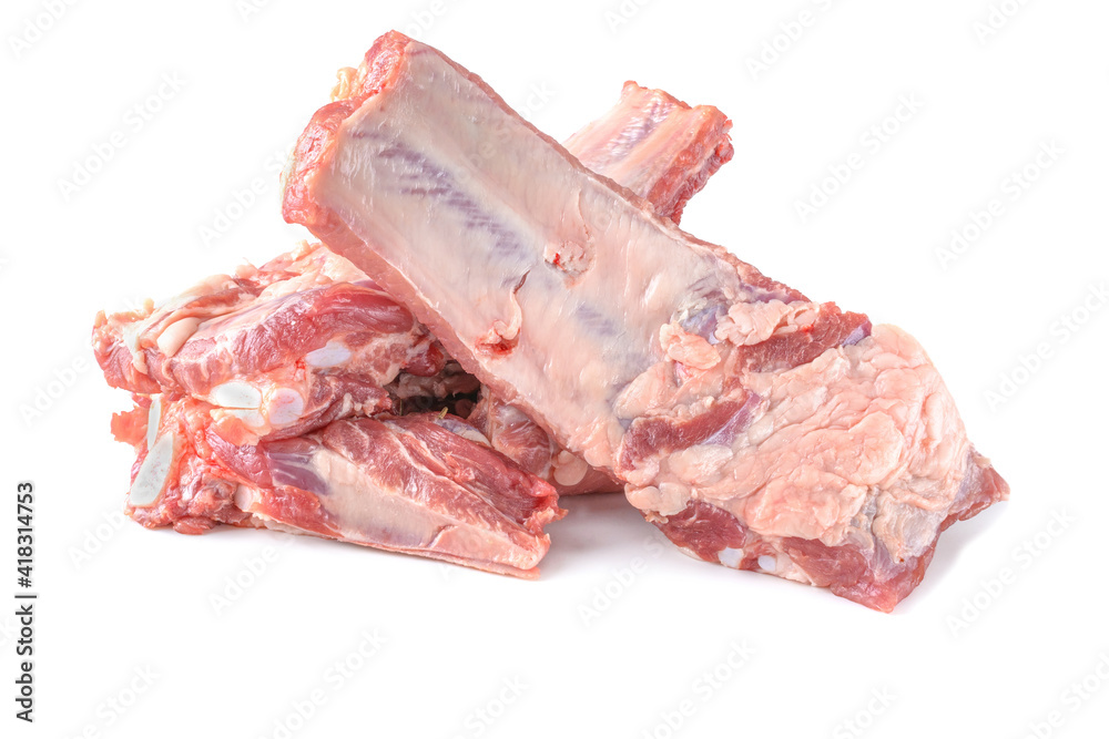 Raw pork ribs are isolated on a white background.