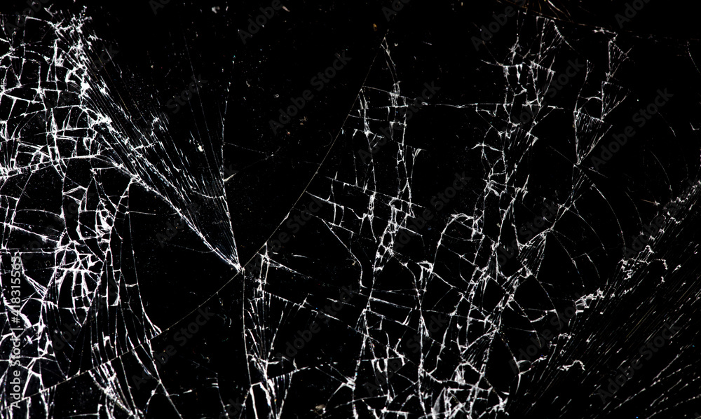 Broken black glass as background.