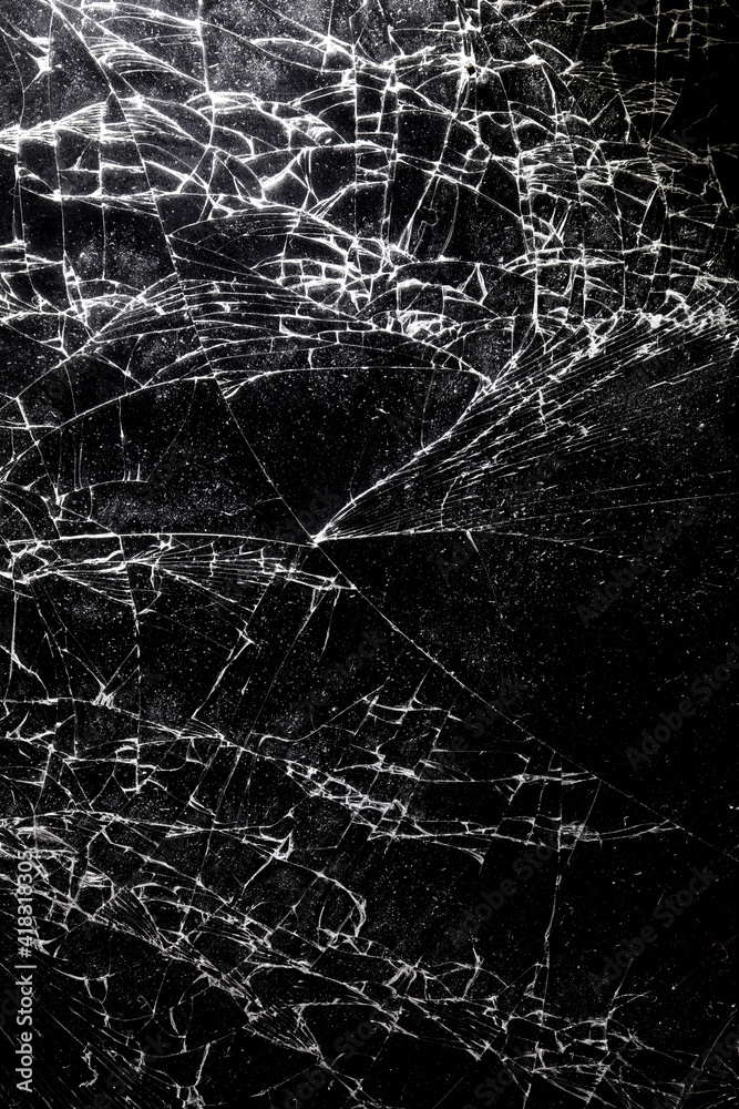 Broken black glass as background.
