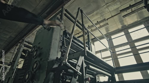 Wallpaper Mural Stack of footage: A man climbs the stairs in an Old printing house of production from the times of GDR and the USSR Torontodigital.ca