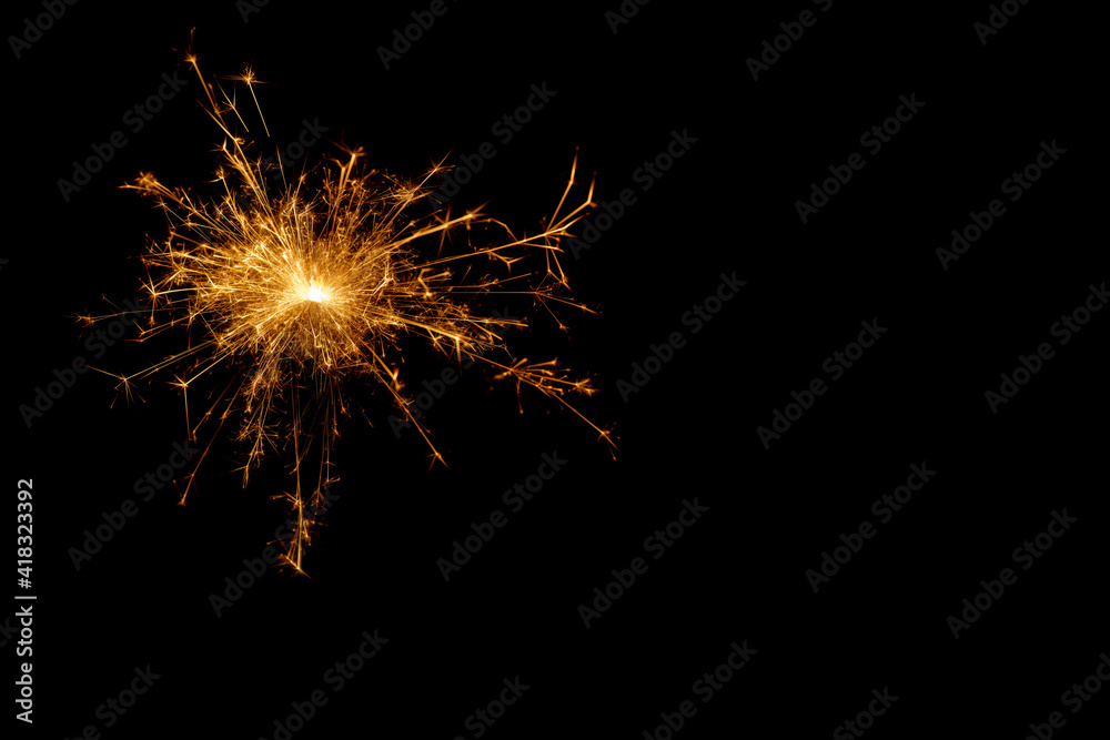 A picture of a real sparkler set against a black background