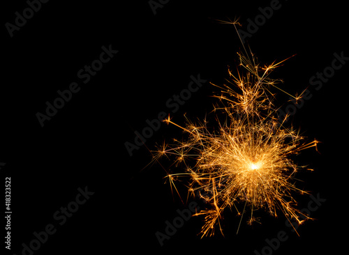 A picture of a real sparkler set against a black background