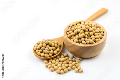 Healthy soybeans In a wooden cup On white background