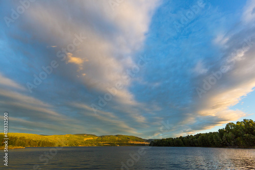 evening landscape at lake Mjosa in Norway with clouds