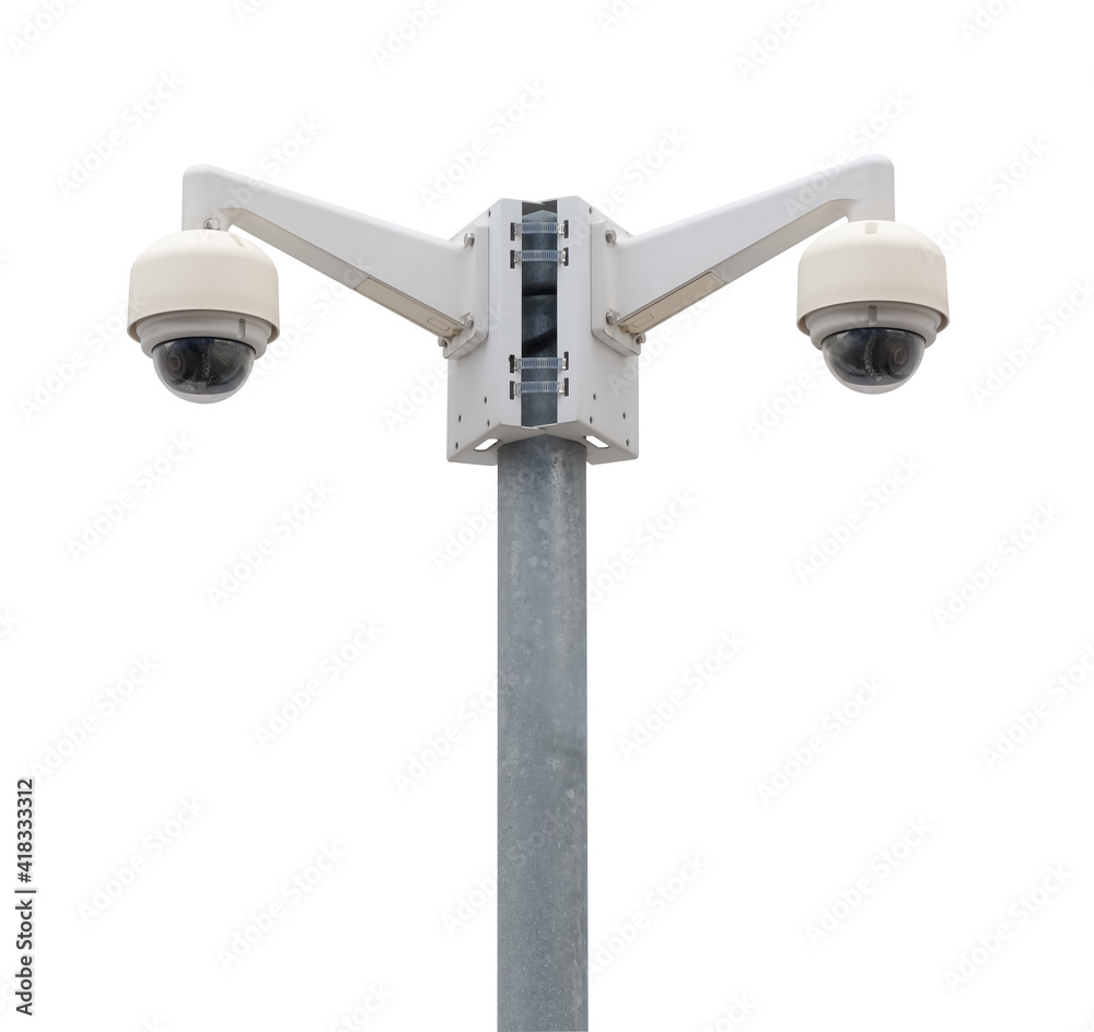 Modern public CCTV camera on pole isolated on white background. Intelligent recording cameras for monitoring all day and night. Concept of surveillance and monitoring with clipping path..