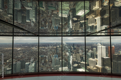 Beautiful view of Toronto city from above with rainy clouds in background. Canada