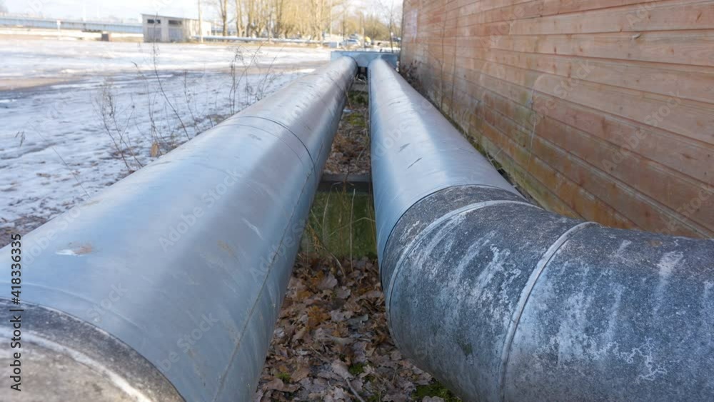 The gas pipes outside the brick wall house in the village The gas pipes outside the brick wall house in the village