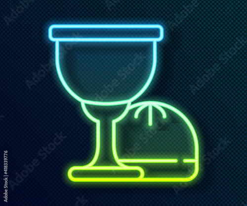 Glowing neon line Holy grail or chalice icon isolated on black background. Christian chalice. Christianity icon. Vector.