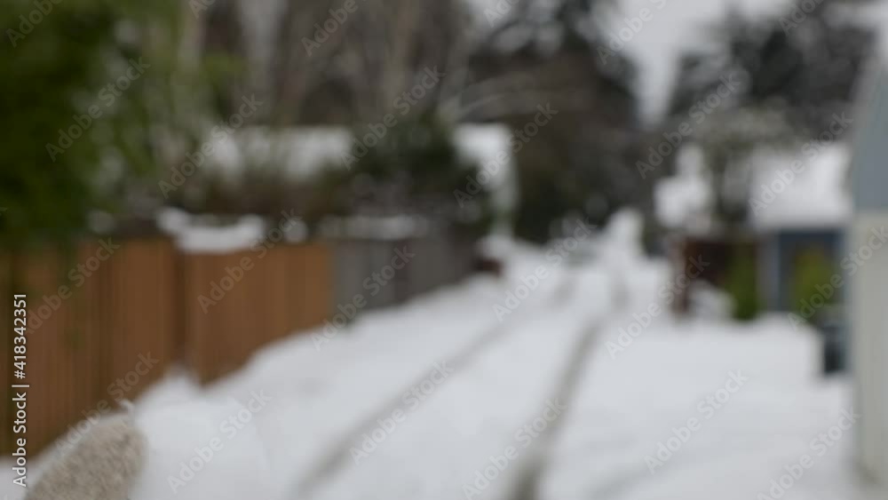 Slow motion shot of person with gloves throwing snowball in the air and catching. Close up with bokeh effect. Slow motion shot of person with gloves throwing snowball in the air and catching. Close up with bokeh effect.
