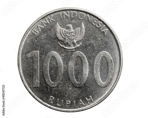 Indonesia thousand rupiah coin on white isolated background