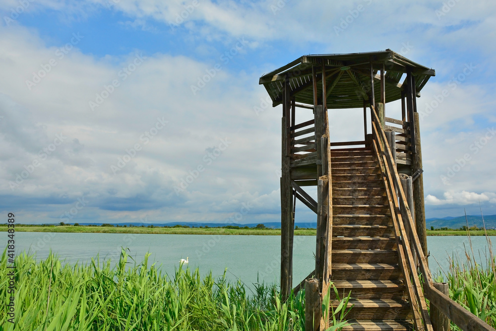 A wooden wildlife observation tower in the wetlands of Isola Della Cona in Friuli-Venezia Giulia, north east Italy
