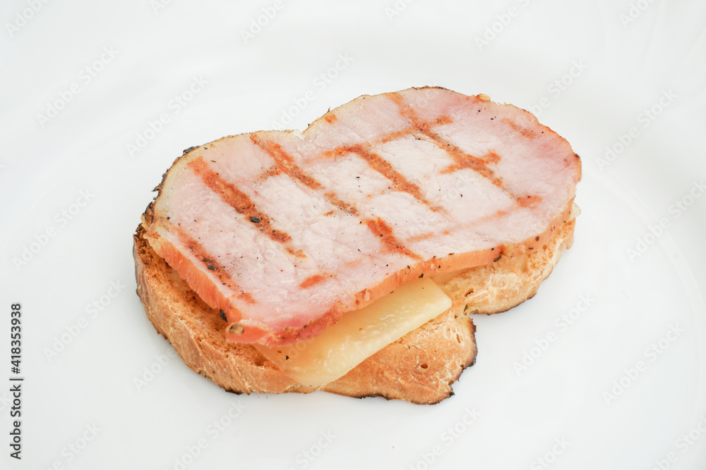 baguette slice with cheese and grilled pork loin pastrami