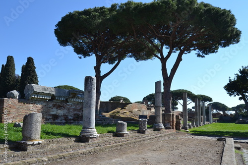 view of ancient Roman ruins with columns at the archeological site of Ostia Antica Rome Italy 