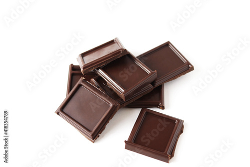 Pieces of chocolate isolated on white background
