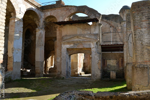 Ancient Roman ruins of caseggiato degli Aurighi in the archeological site of Ostia Antica Rome Italy 