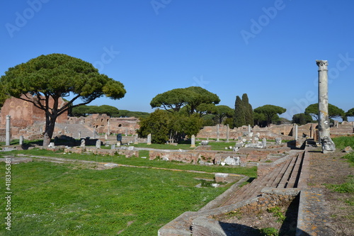 view of ancient Roman temple with marble columns in Ostia Antica Rome Italy 