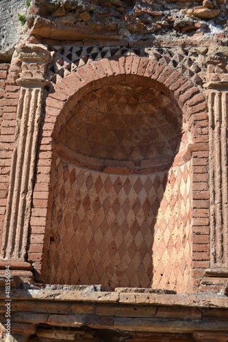 Detail of ancient Roman domus semiround with pattern