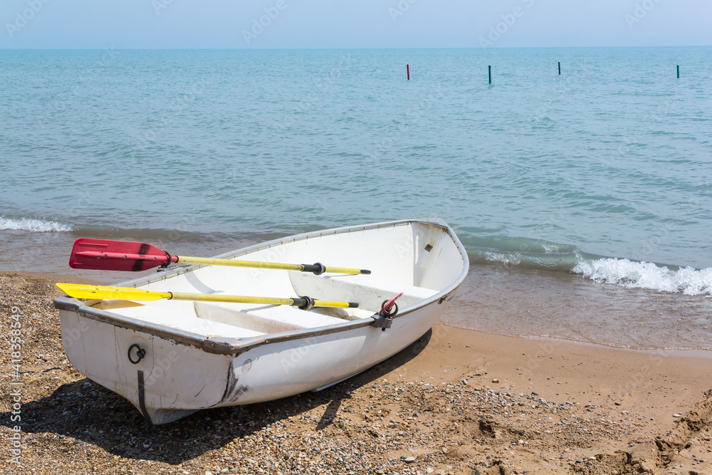 Row boat on the shores of Lake Michigan Row boat on the shores of Lake Michigan