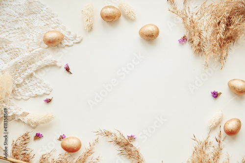 Happy Easter concept. Beige minimalism background with cope space, top view banner