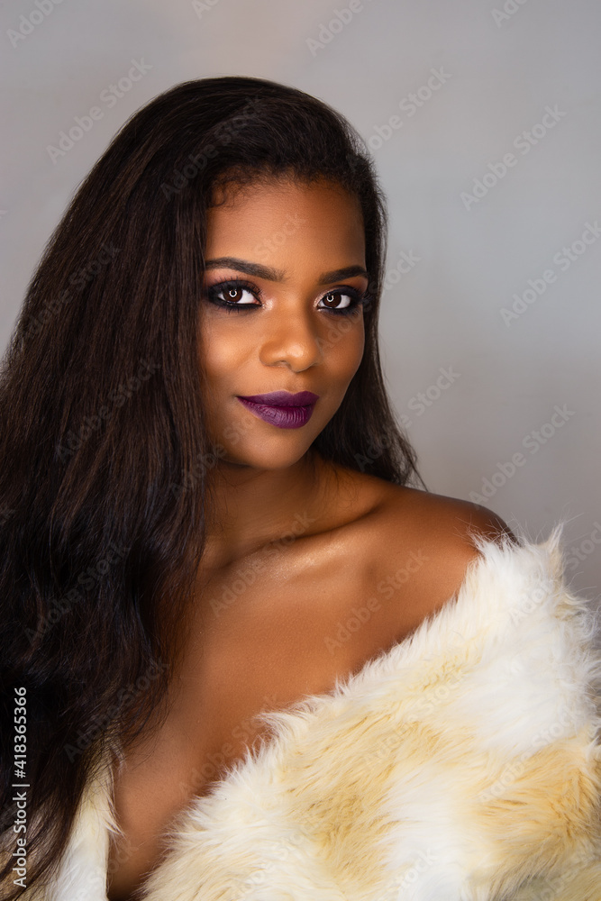 Fashion beauty African young women portrait. Beautiful black woman. Afro girl. Headshot of black woman. Professional makeup and beautiful skin. Pretty girl with long black hair. Fashion beauty African young women portrait. Beautiful black woman. Afro girl. Headshot of black woman. Professional makeup and beautiful skin. Pretty girl with long black hair.