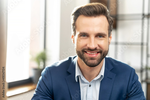 Stylish trendy modern expensive clothing lifestyle person concept. Close up photo portrait of attractive nice sharp-dress with neat stubble man looking at camera isolated, in the office background