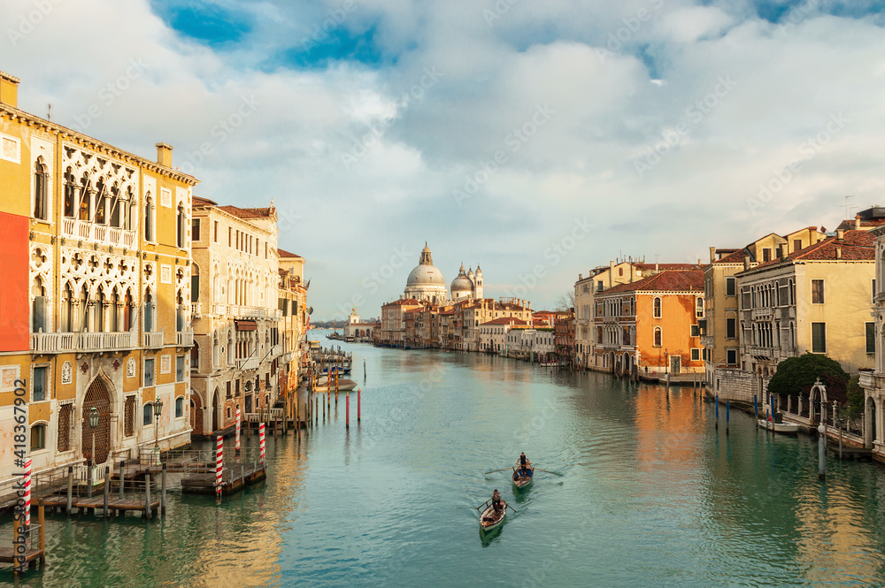 Two rowers in the Grand Canal in Venice, Italy