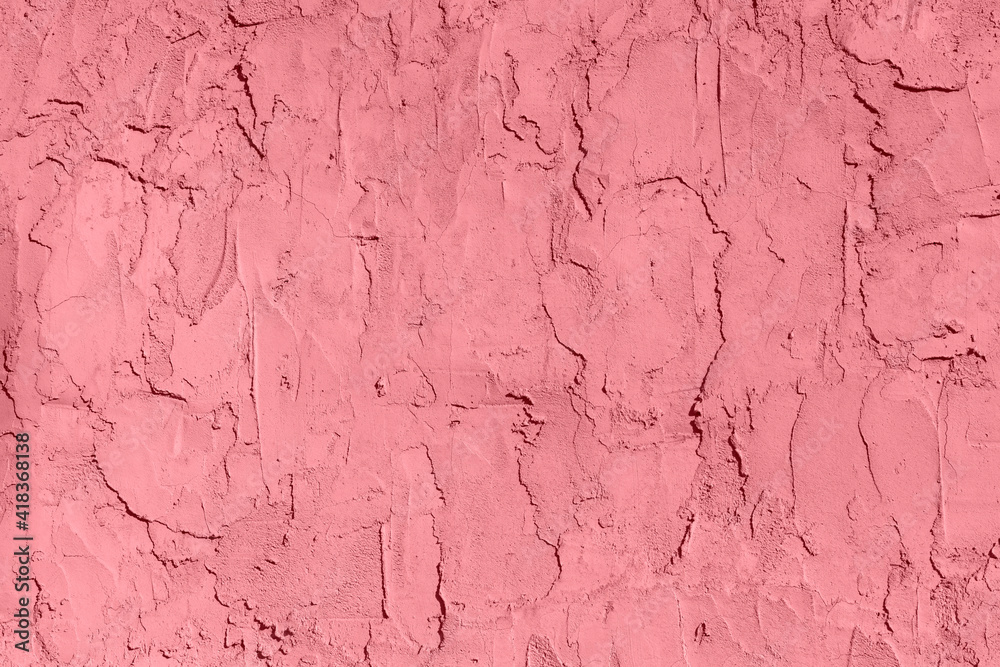A dusty rose-colored grungy wall, a creative copy of the space,