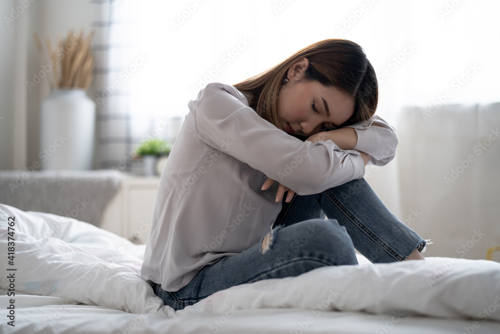 Asian woman with stress, She kept herself alone in her bedroom, Depression. Asian woman with stress, She kept herself alone in her bedroom, Depression.