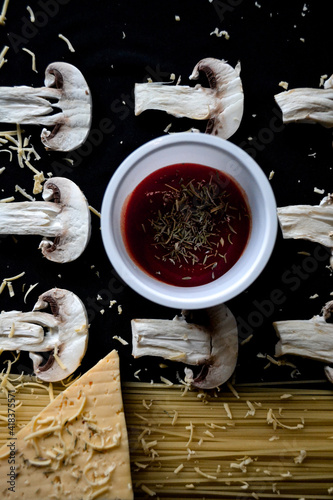 chopped mushrooms with pasta, cheese and souce photo