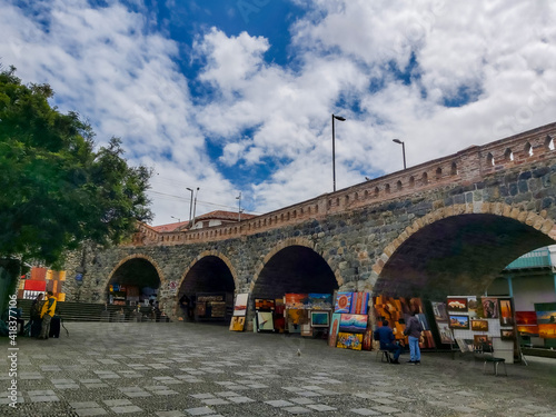 Cuenca, Ecuador; November 4 of 2019: Art fair under the "Broken Bridge", near the Tomebamba river