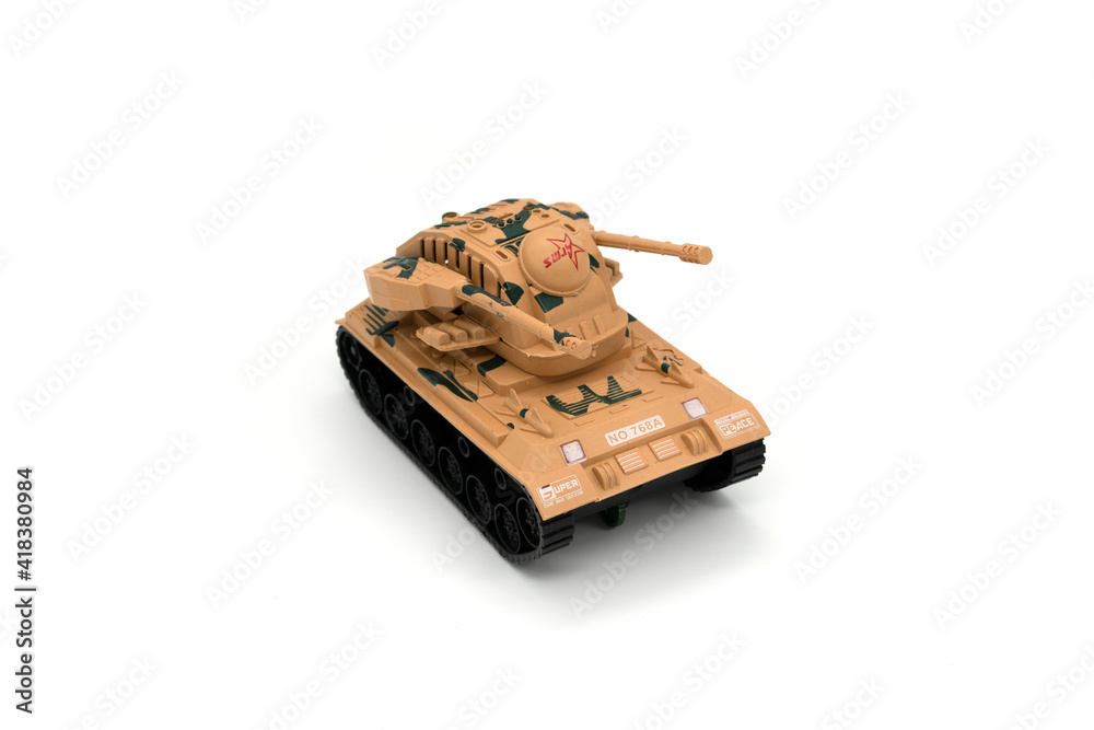 Plastic model of a military toy car isolated on white background. Plastic model of a military toy car isolated on white background.