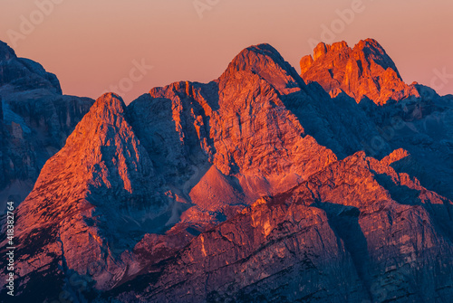 First light on mountains of Dolomites © Mikael