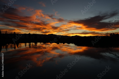 Mountain Sunset with Lake Reflection 