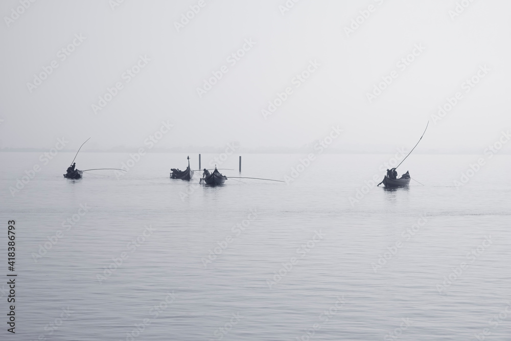 Fototapeta premium Traditional fishing boats during toil