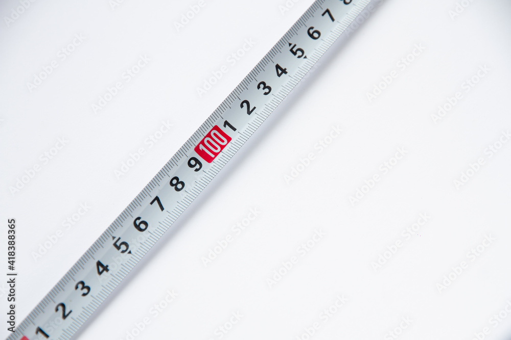 white measuring tape on a white background tape in centimeters white measuring tape on a white background tape in centimeters