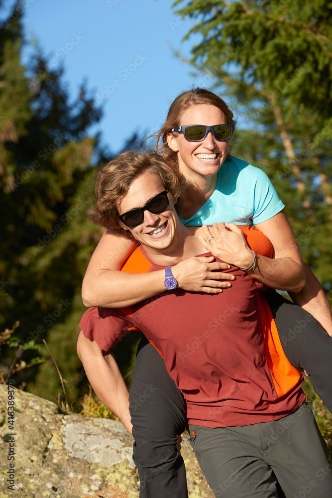 Hikers playing piggyback Hikers playing piggyback
