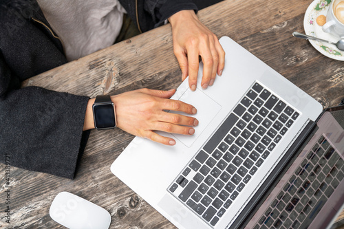 Female freelancer blogger using laptop photo