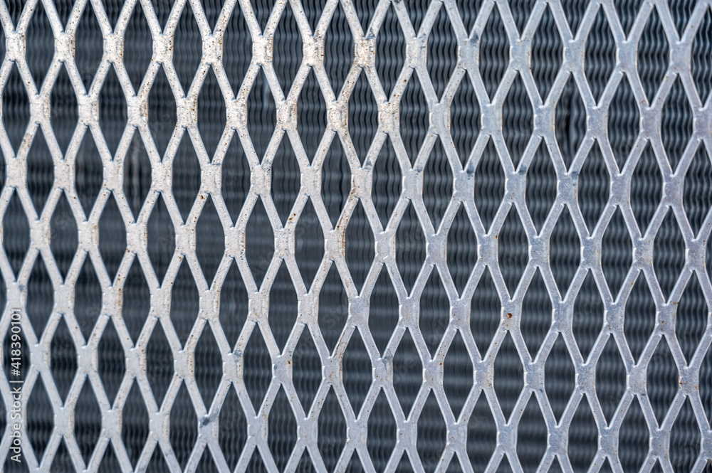 Fototapeta premium Metal screen and heat exchanging fins of a air conditioner