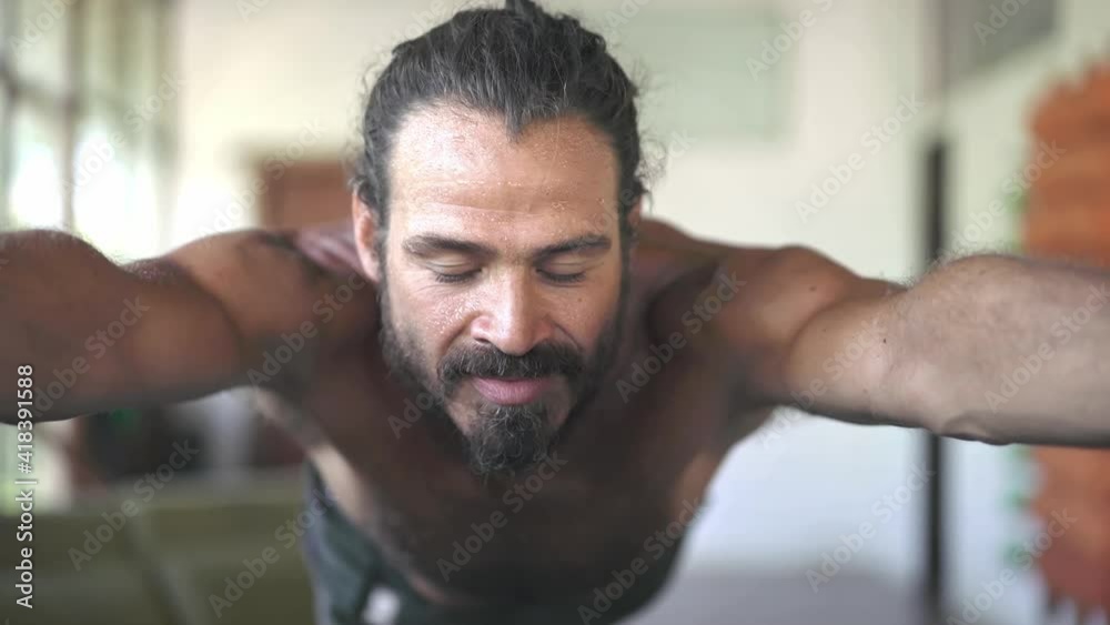man yoga teacher practicing yoga in spacious yoga studio. Healthy active, mindfulness wellness lifestyle. wellbeing, peaceful relaxation. man yoga teacher practicing yoga in spacious yoga studio. Healthy active, mindfulness wellness lifestyle. wellbeing, peaceful relaxation.