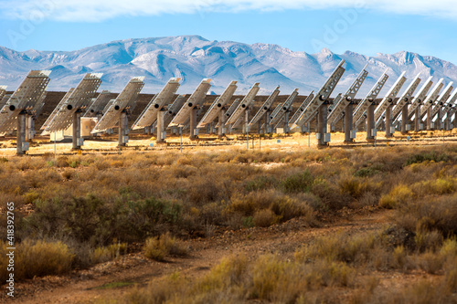 Rows of solar panels in landscape, side view, Cape Town, Western Cape, South Africa