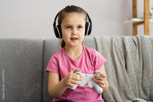 Addictive Child Kid Gamer Playing Video Game photo
