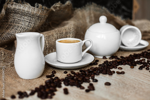 white cup, coffee beans, espresso, dark background