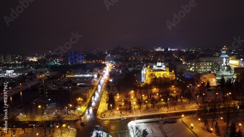 Wallpaper Mural Winter night lights illuminated city center aerial view. Fly to Dormition Cathedral near Svyato-Pokrovsʹkyy Monastyr and Independence square in Kharkiv, Ukraine Torontodigital.ca
