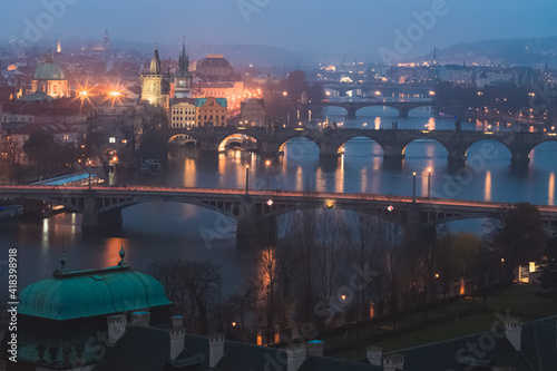 Photography Night cityscape view from Letna Park of Old Town Prague and iconic landmarks like Charles Bridge over the Vltava River in the Czech Republic capital city