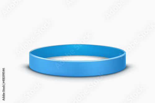 blue rubber band lying on white back