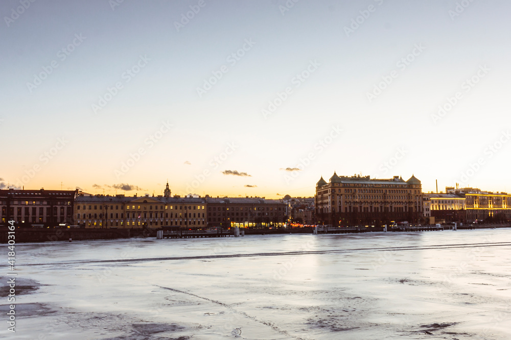 Fototapeta premium sunset city ice river navigation winter Saint Petersburg europe