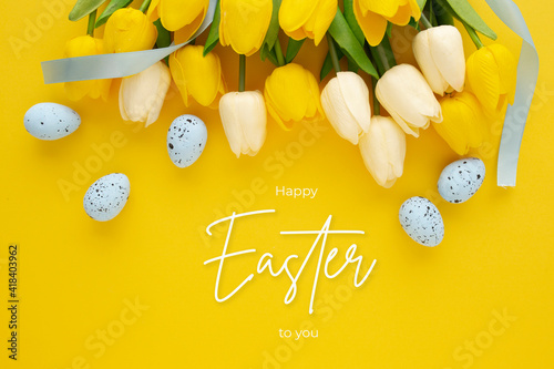 Happy easter background with eggs and tulips and lettering © Daniel