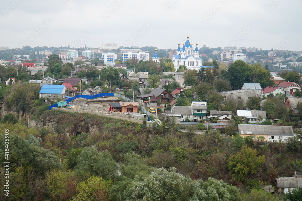 Streets with private houses in a beautiful picturesque canyon of the Smotrych River in the city of Kamenets-Podolsk